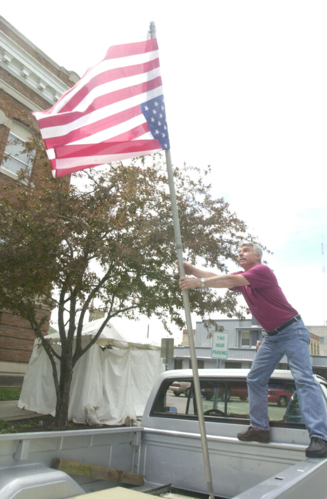 An American flag posted upside-down in protest.